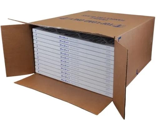 Open cardboard box filled with neatly stacked white file filters
