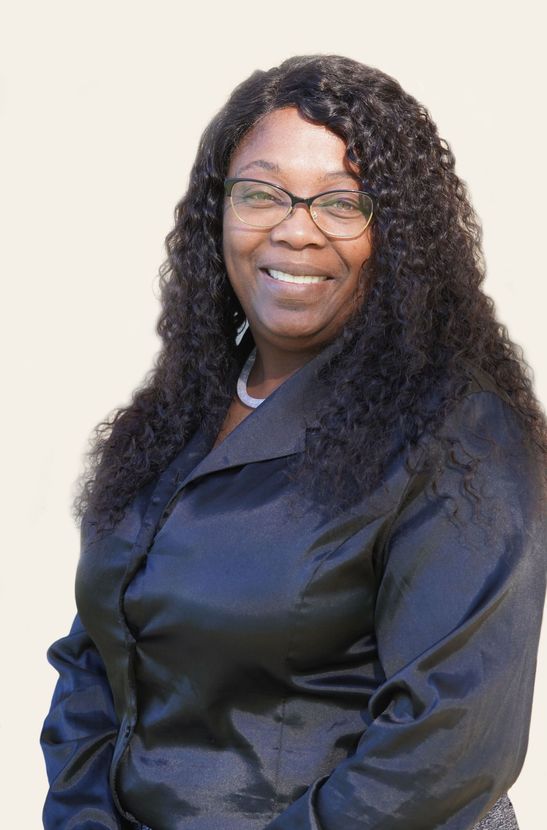Terry Dow-Harris, Realtor, with contact info and Vreeland Real Estate logo, against a blue background.