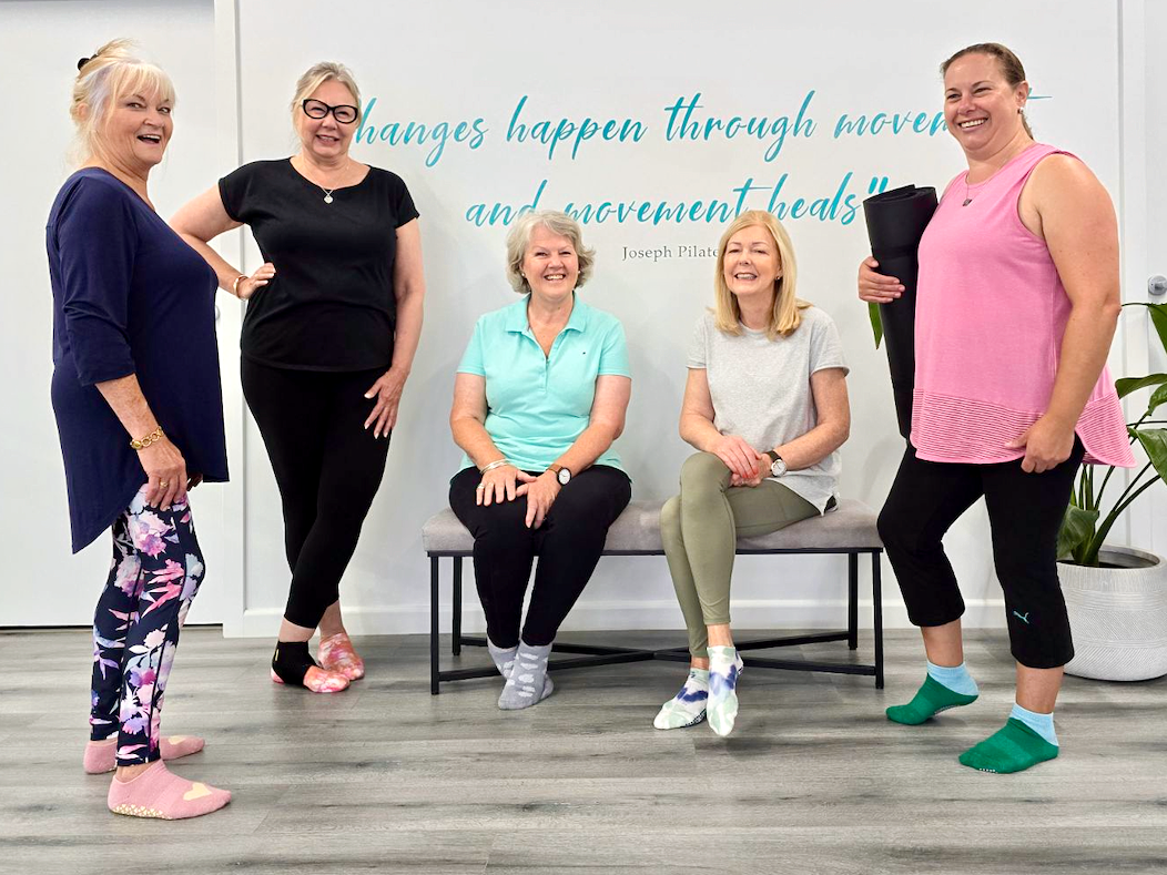 Group of women chatting at Good Vibes Pilates Studio