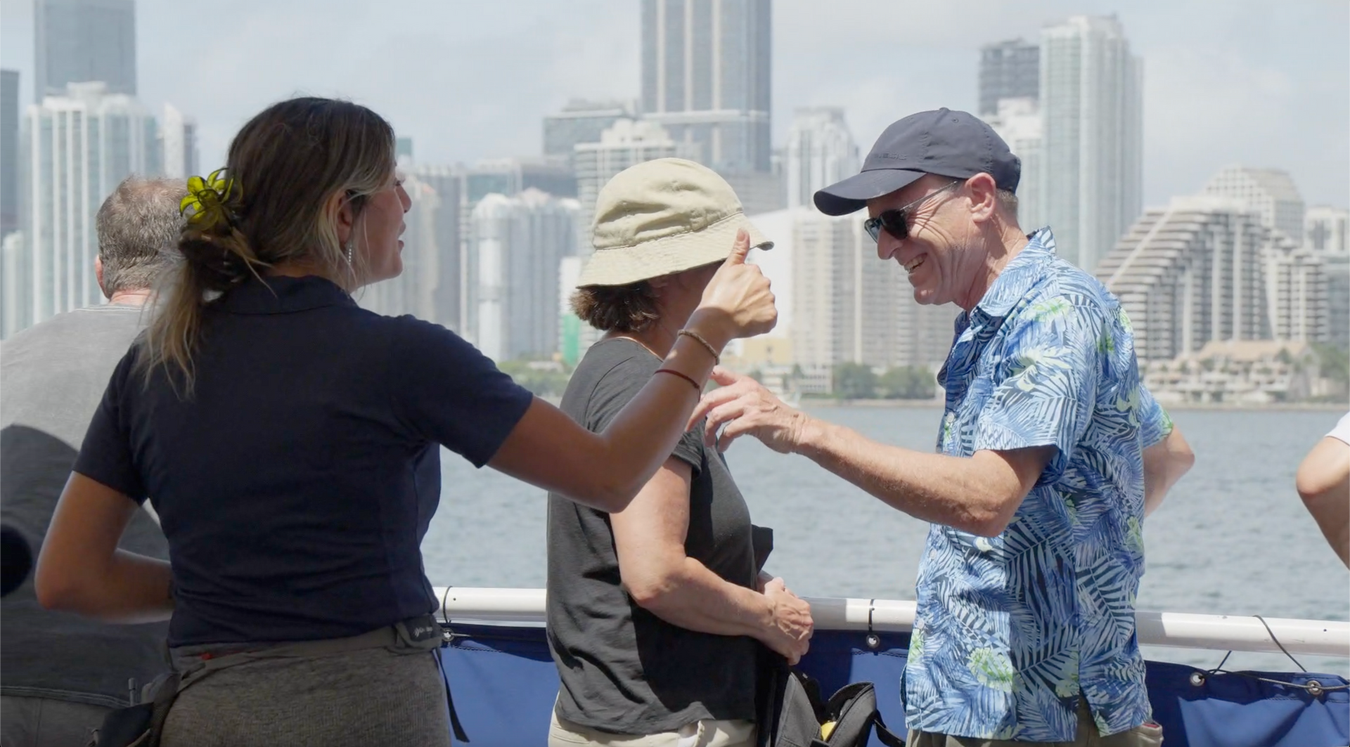 tour guide on the Star island Celebrity boat cruise talking to the passenegers.