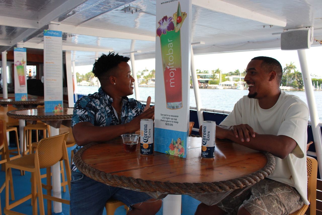 Passengers enjoying drinks of the Mojito Bar onbord the Miami Celebrity Sightseeing Boat toru