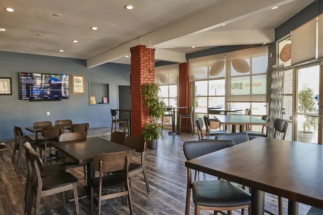 A Restaurant with Tables and Chairs — Inglewood, CA — Dulan's Soul Food Kitchen