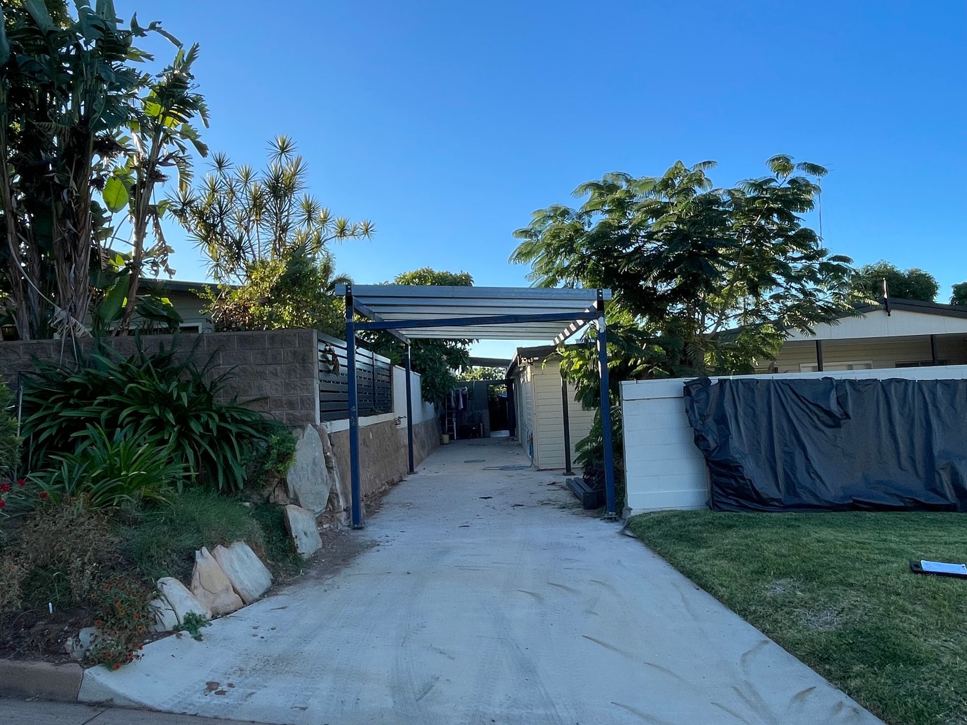 Driveway Leading to a Home; Blue Sky Overhead — Lincoln Fabrication in Miles End, QLD