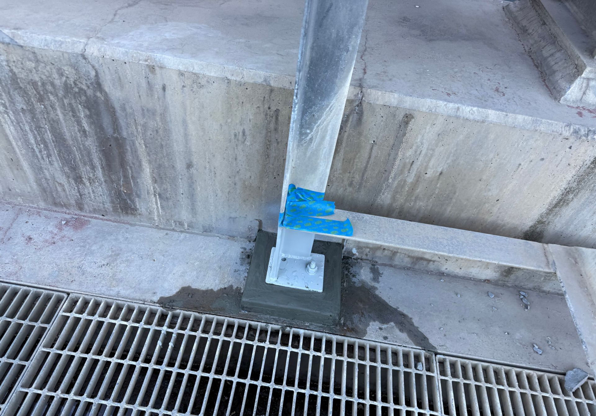 Metal Grate Attached to Concrete With Metal Bracket — Lincoln Fabrication in Miles End, QLD