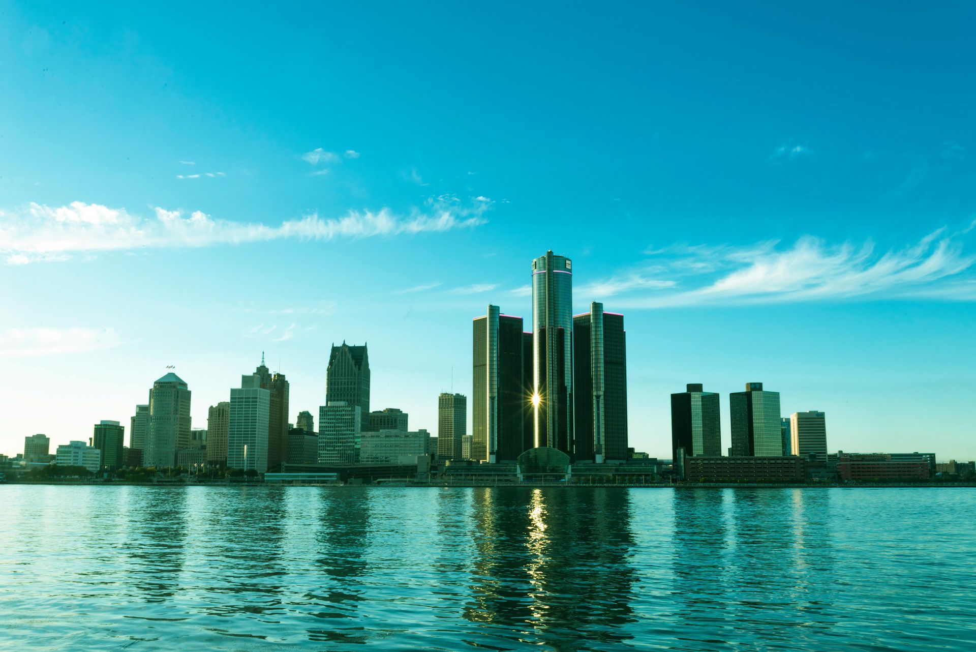 The skyline of New Jersey is reflected in a lake. The skyline of New Jersey is reflected in a lake.