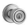 A door knob with a key in it on a white background.