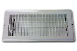 A white air vent is sitting on a white surface.