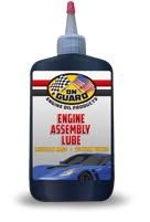 Blue bottle of Gum Guard engine assembly lube with red cap and nozzle
