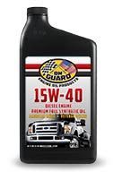 Black motor oil bottle labeled “Guard 15W-40” with red and white stripes and trucks on the label
