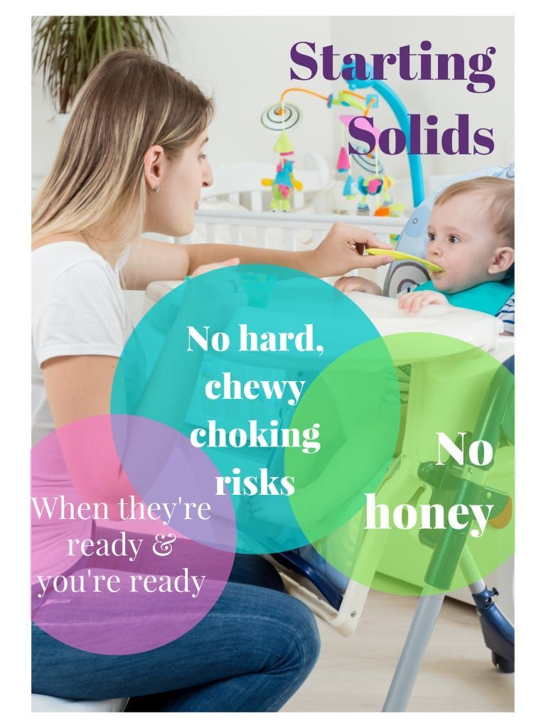 Parent and baby at a table with