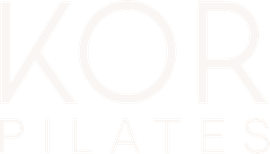 Pale beige logo text reading “KOR PILATES” on a white background