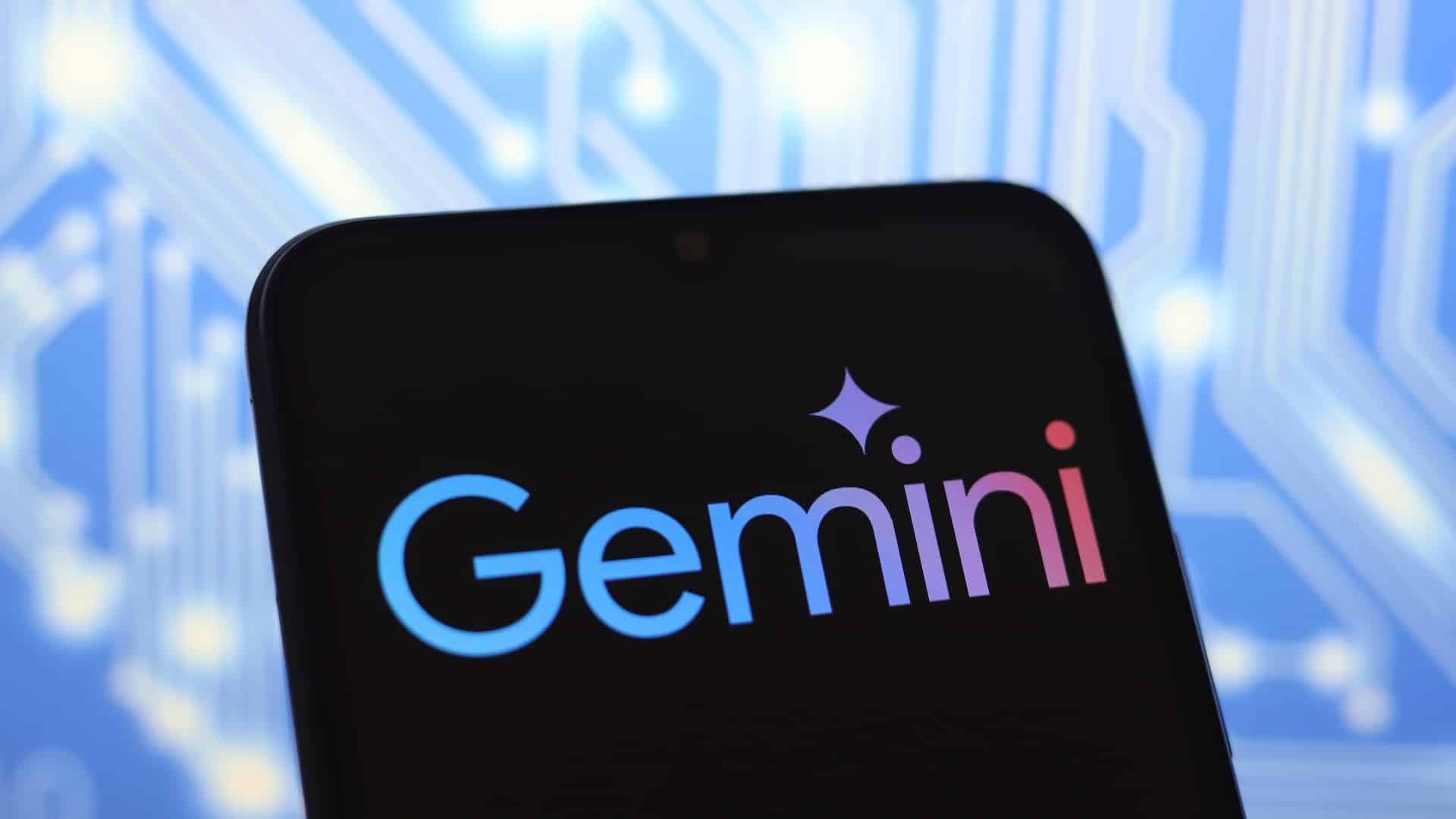 Phone screen displaying the Gemini cryptocurrency exchange logo, against a blue circuit board background.