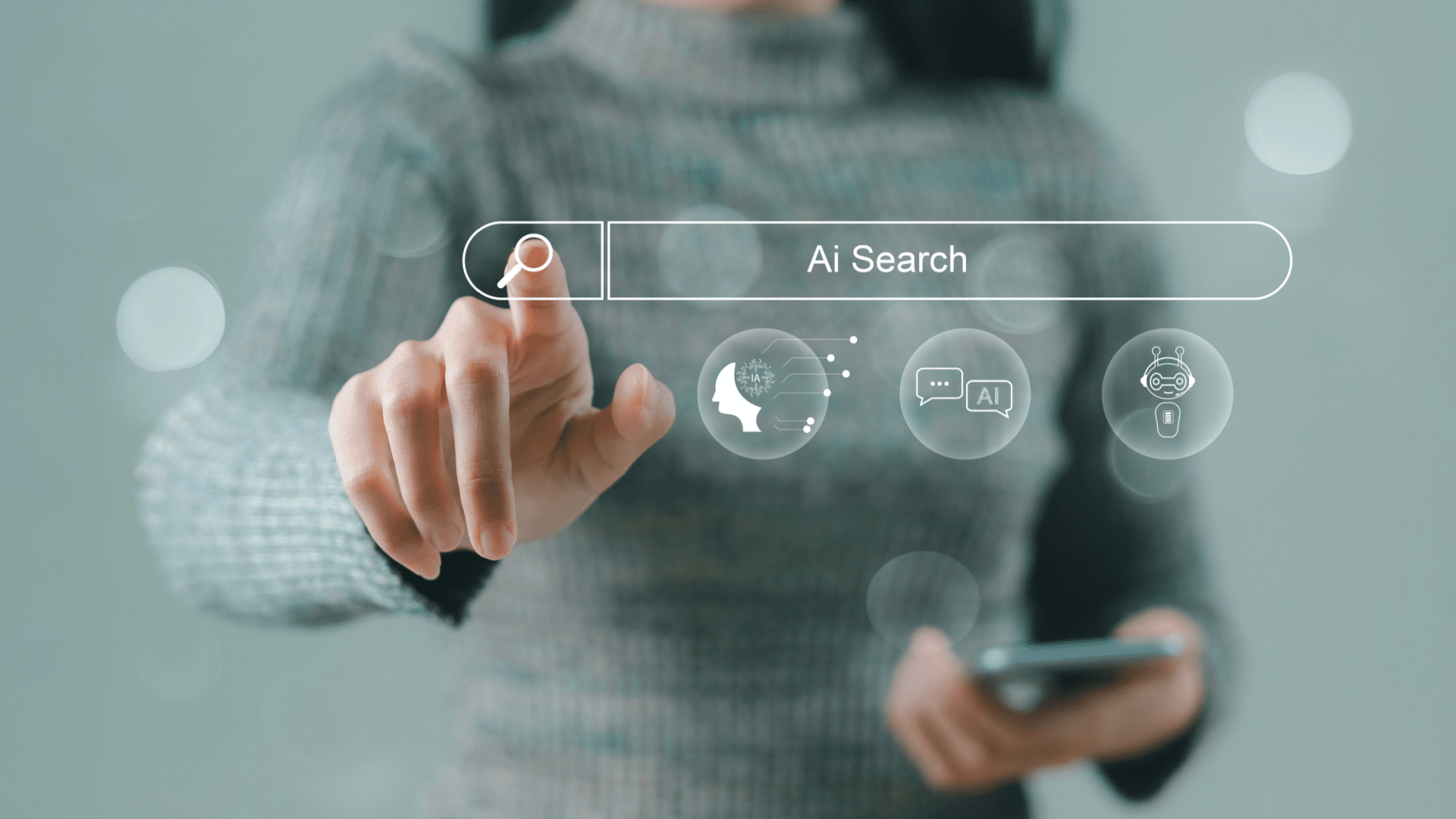 Woman's hand touching AI search bar on a digital interface, icons below, phone in other hand.