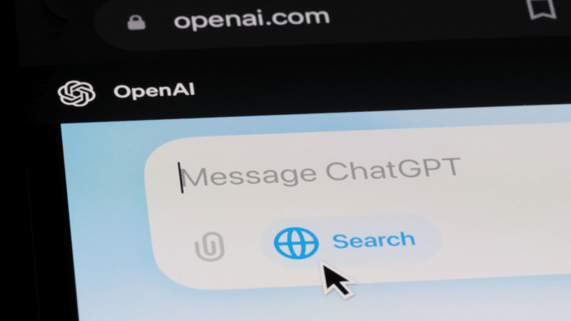 OpenAI website on a mobile device, showing the ChatGPT message input with a 
