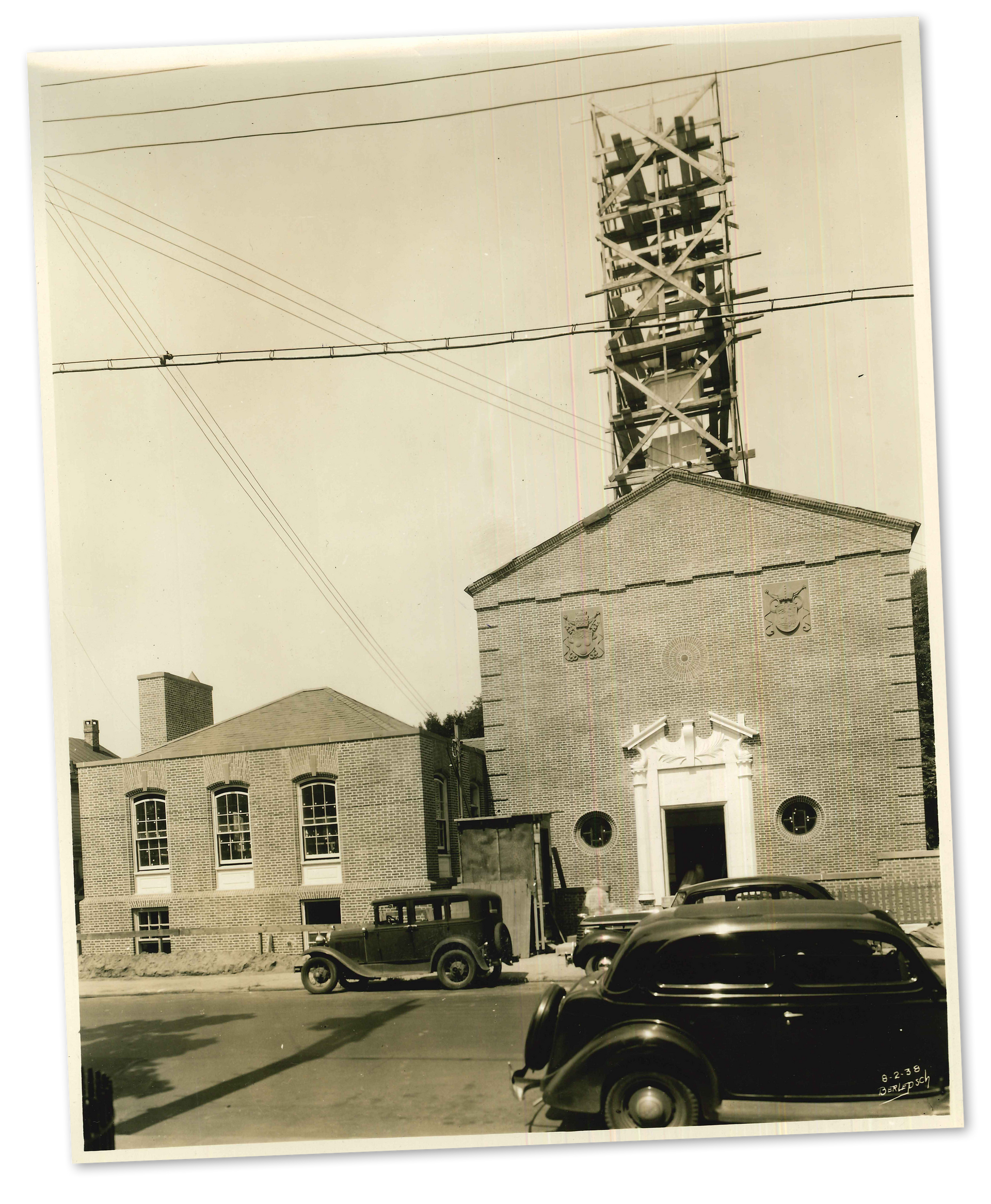 A postcard showing a church and a house in new york