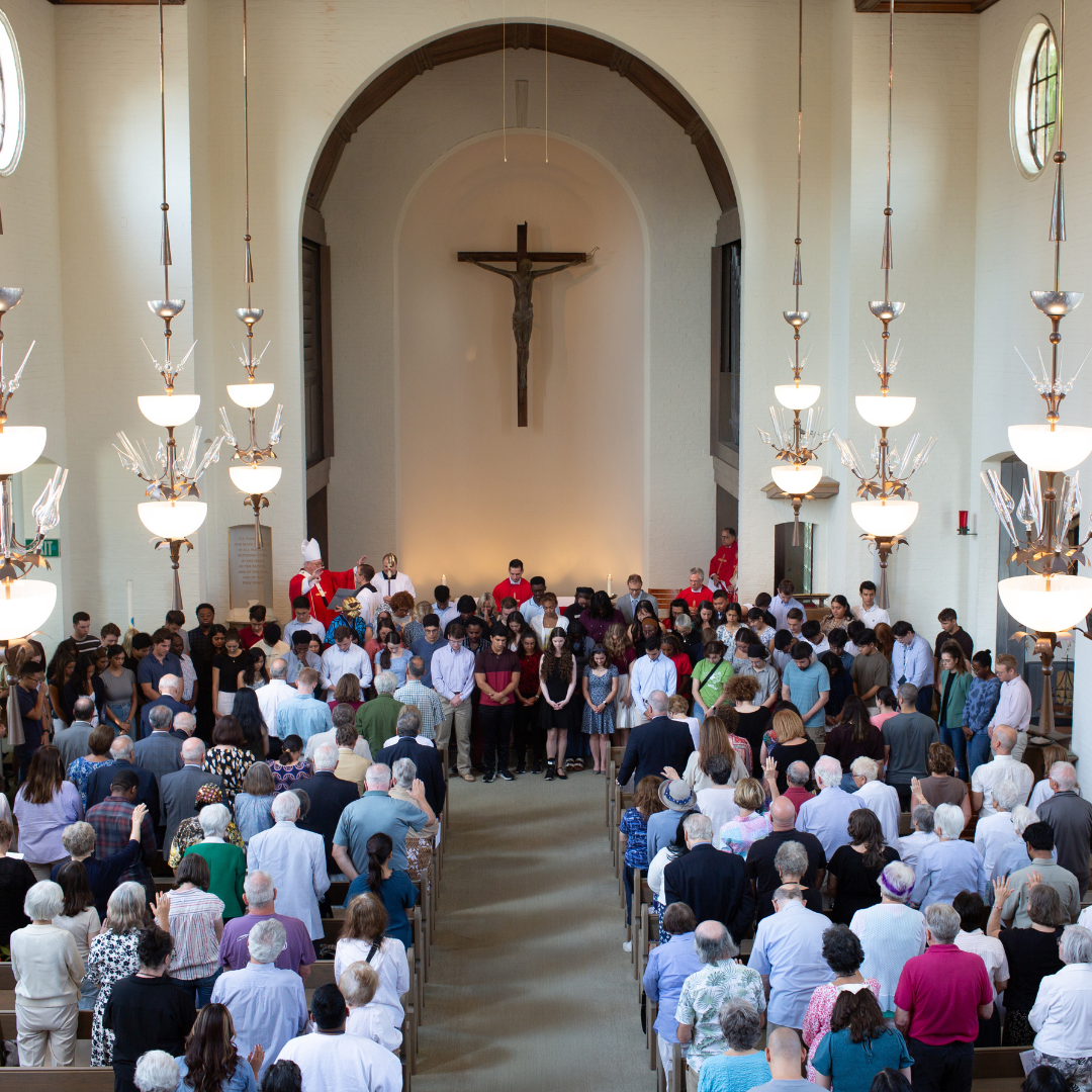 photo of people gathered for Mass at the beginning of the academic year