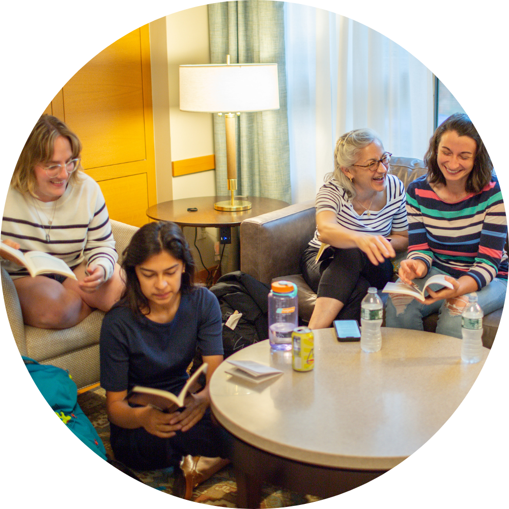 Four women participating in a reading group.