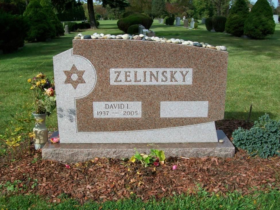 Headstone in a cemetery with a Star of David and the name ZELINSKY. Dates: 1937-2008.
