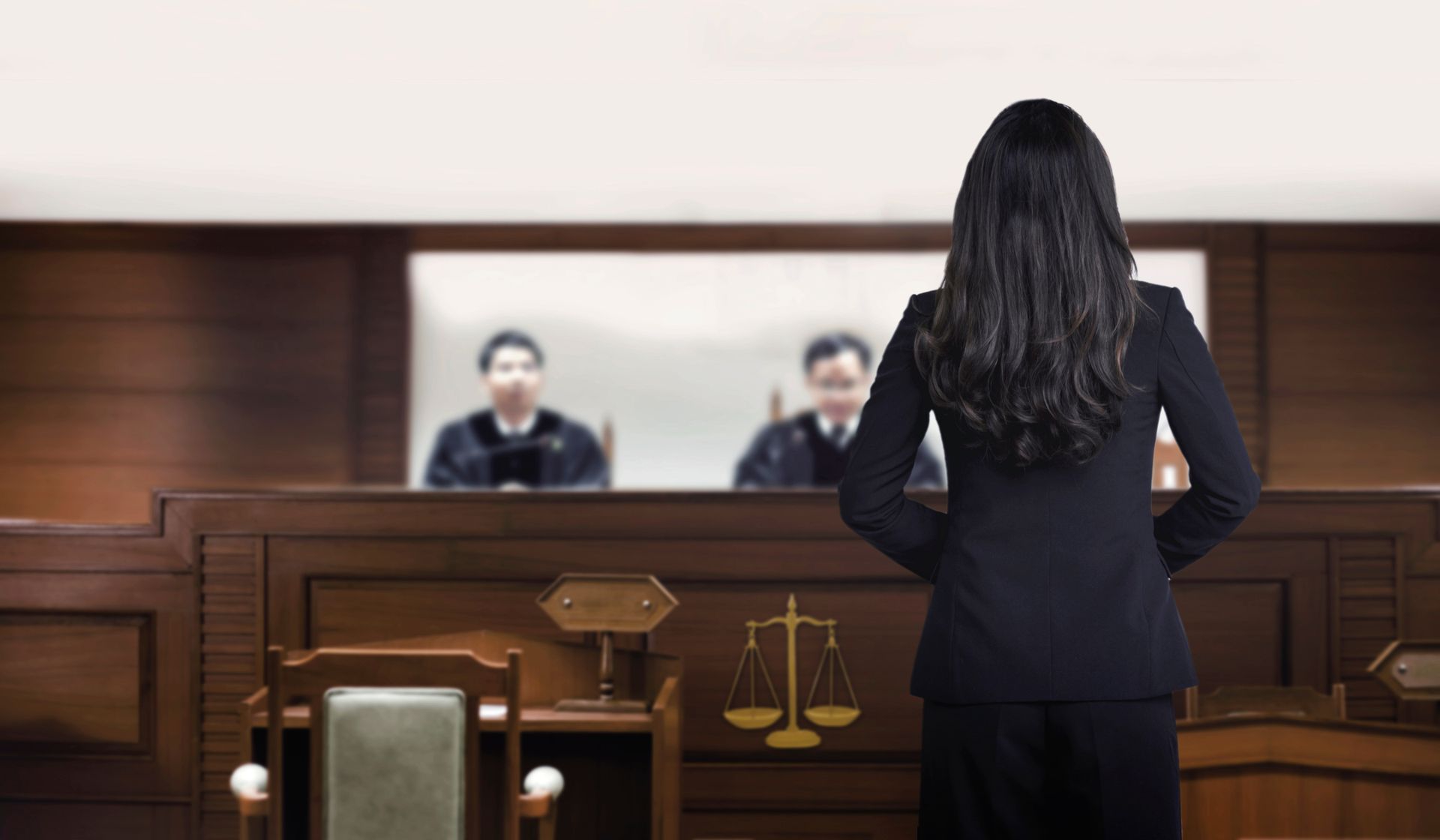 attorney woman on courtroom talking to magistrate in court box. for law and legal adjustment concept. The attorney communication on courtroom.