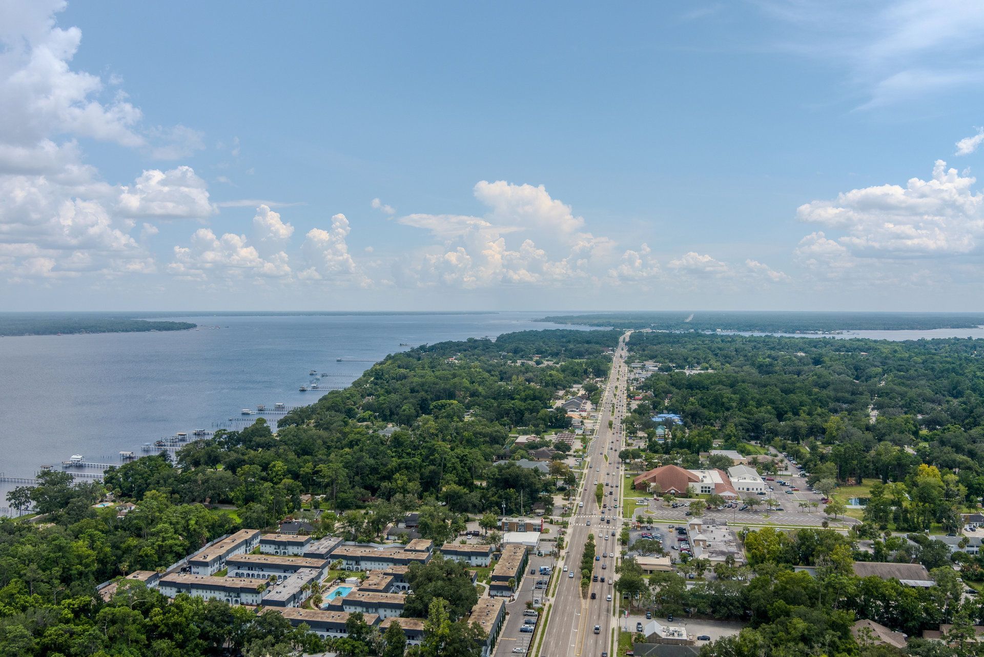 Aerial view of Orange Park, Florida, with the St. Johns River and tree-lined neighborhoods along US-17