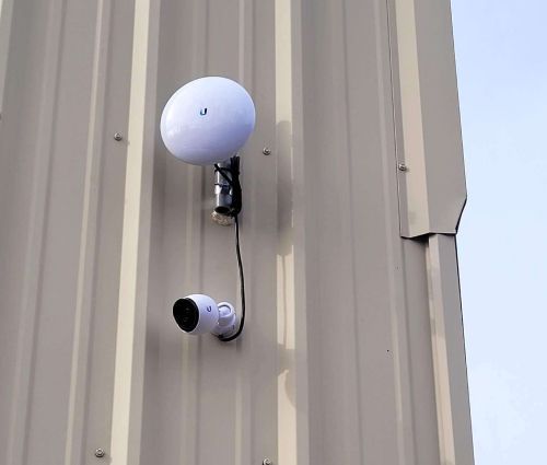 Security camera and wireless antenna mounted at StorMark Self Storage on Riverside Drive in Danville, Virginia