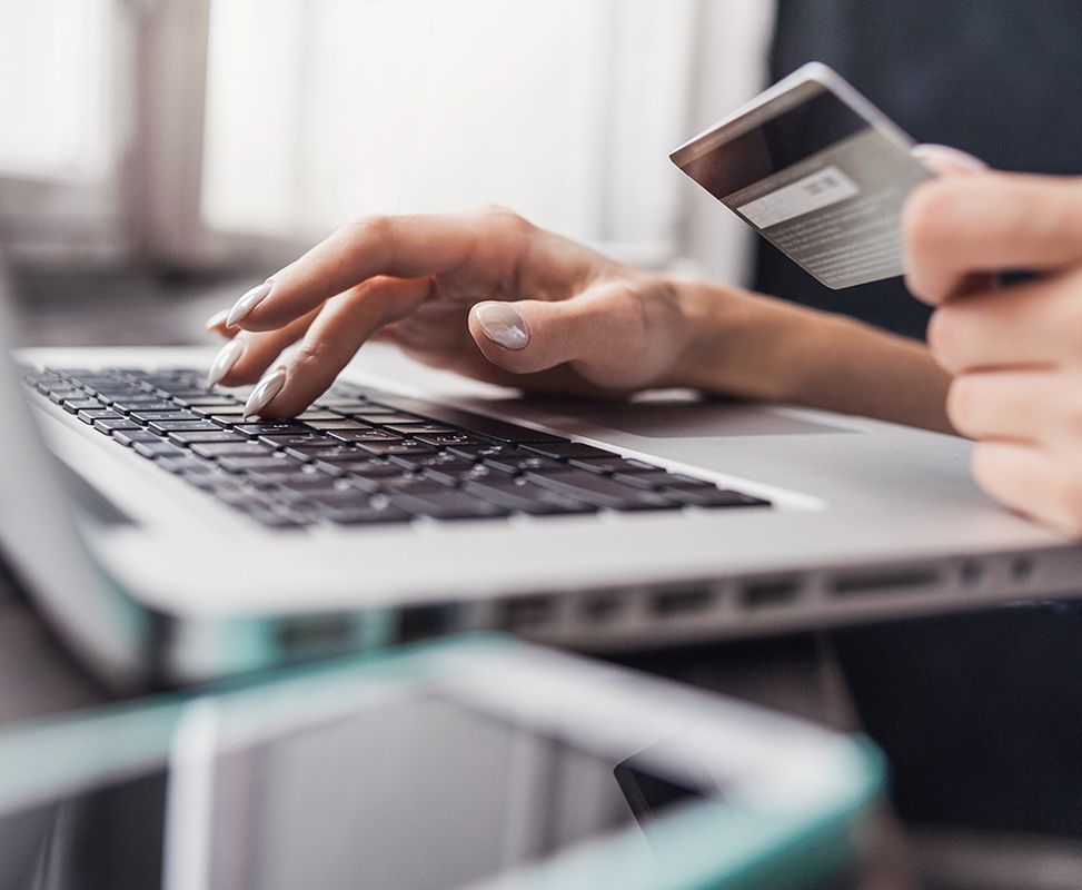 Person Holding Credit Card