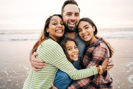 Smiling Parents With Two Children — Central Valley, NY — The Law Office of David V. Hasin Smiling Parents With Two Children — Central Valley, NY — The Law Office of David V. Hasin