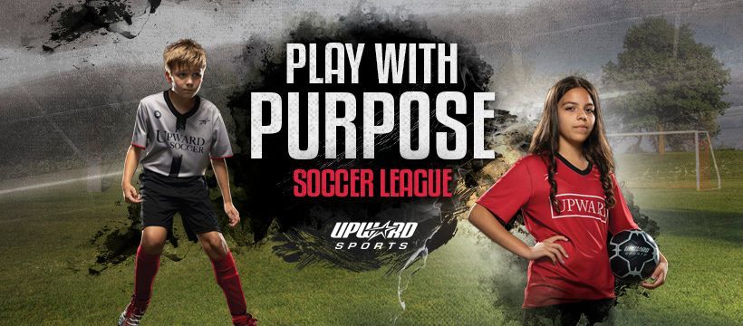 A boy and a girl are playing soccer in a soccer league.
