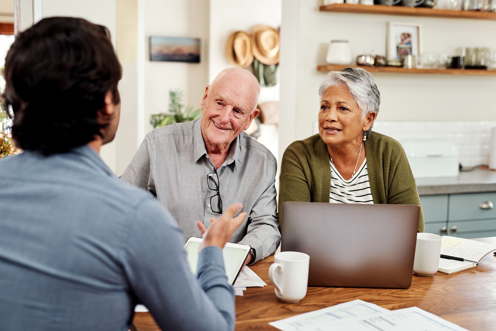 Old Couple Talking To Insurance Agent - Chicago, Illinois - J & L Multiservices Agency LLC 