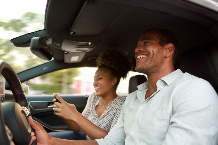 Couple On The Car — Chicago, IL — J&L Multiservice Agency