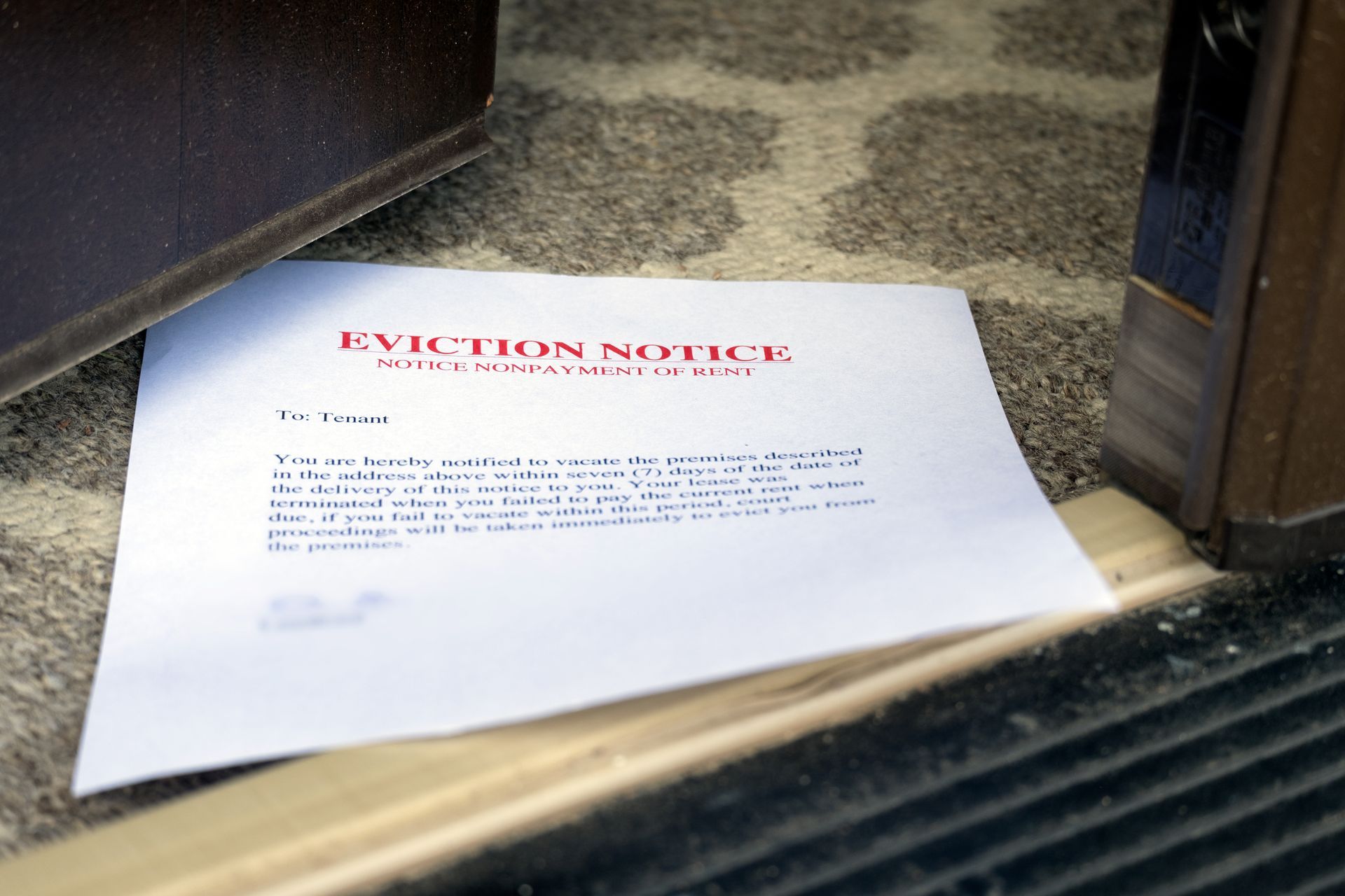 EVICTION NOTICE SLIPPED UNDER OPENED ENTRANCE DOOR 