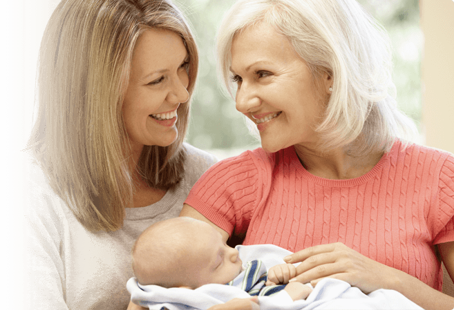 Happy Women Holding a Baby — Tucson, AZ — Associated Dermatologist Happy Women Holding a Baby — Tucson, AZ — Associated Dermatologist