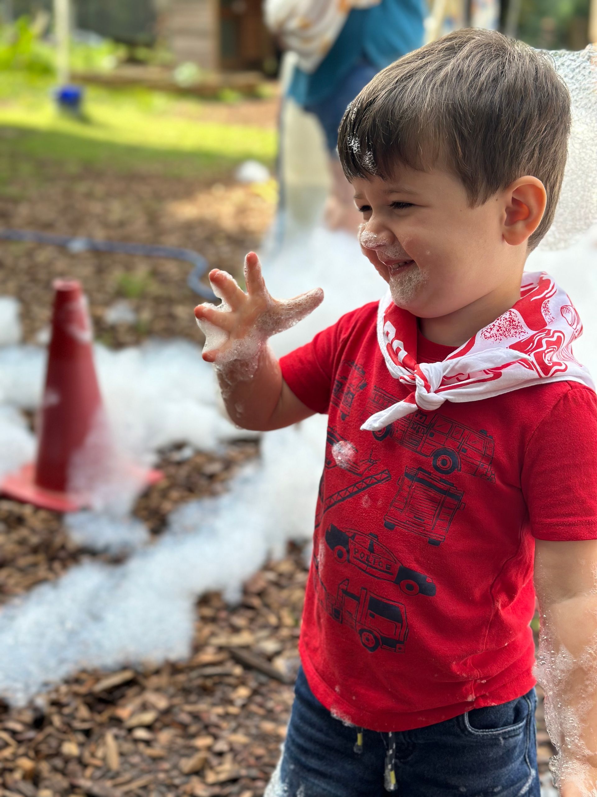 Montessori child during an outdoor activity