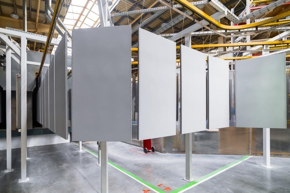 A Row of White Boxes Hanging From the Ceiling in a Factory — Alamo Powder Coaters in Mittagong, NSW