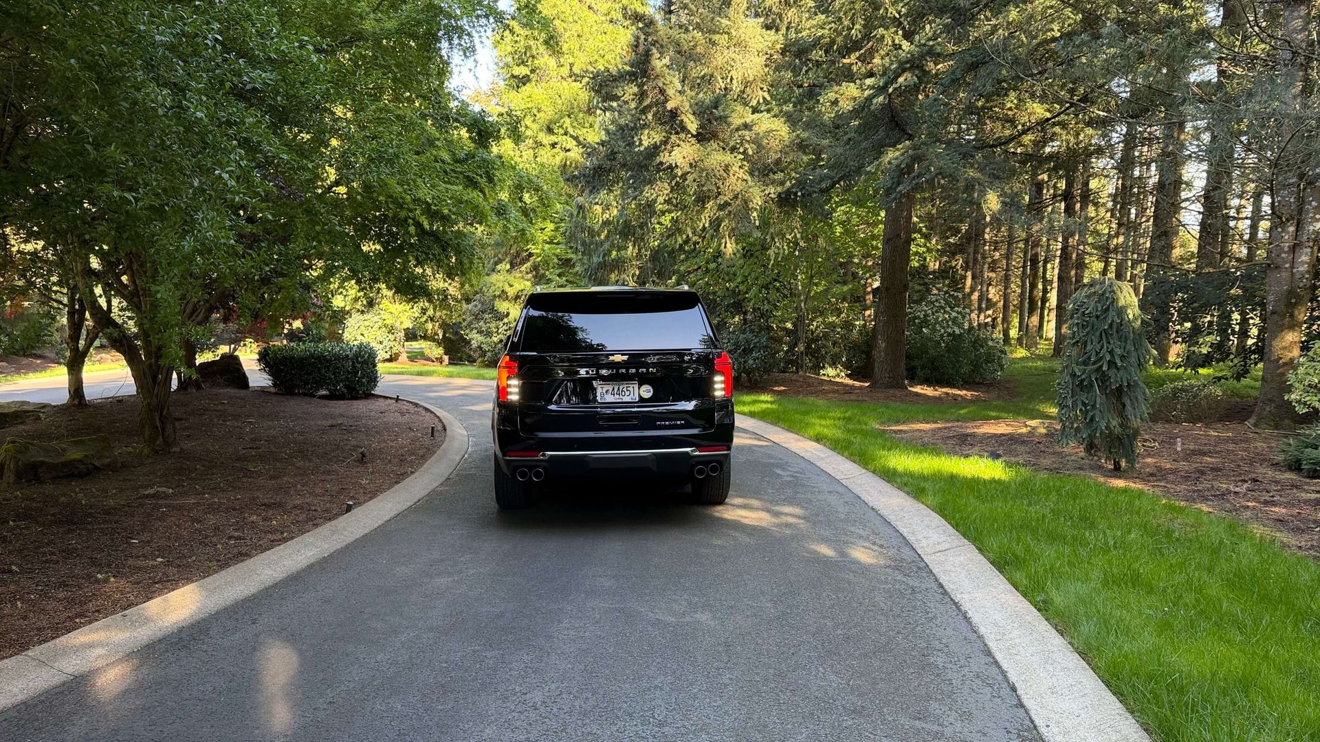 Executive car service Portland — black SUV arriving for a corporate pickup