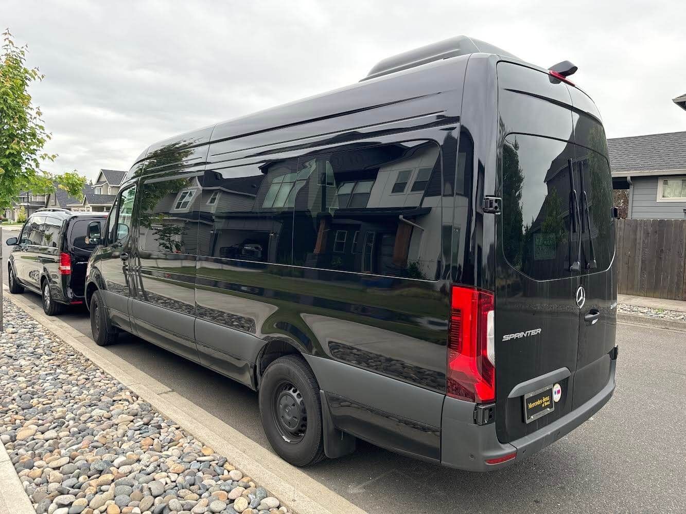 Executive sprinter van chauffeur service staged outside a Portland venue for event transportation