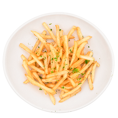 Plate of French fries sprinkled with herbs on a white dish