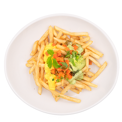 A bowl of fries topped with guacamole, diced tomatoes, and cilantro