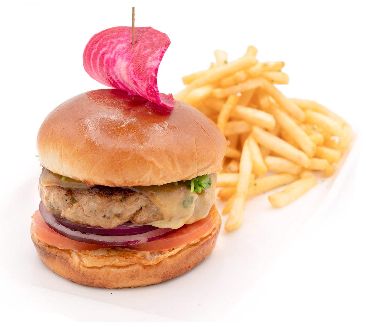 Burger with fries and a pink potato chip garnish on a white plate