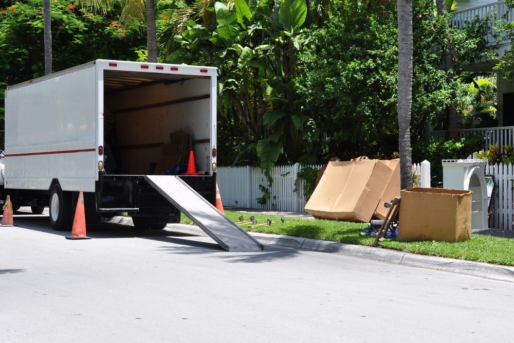 A White Moving Truck is Parked on the Side of the Road — Ready To Move in Mullumbimby, NSW