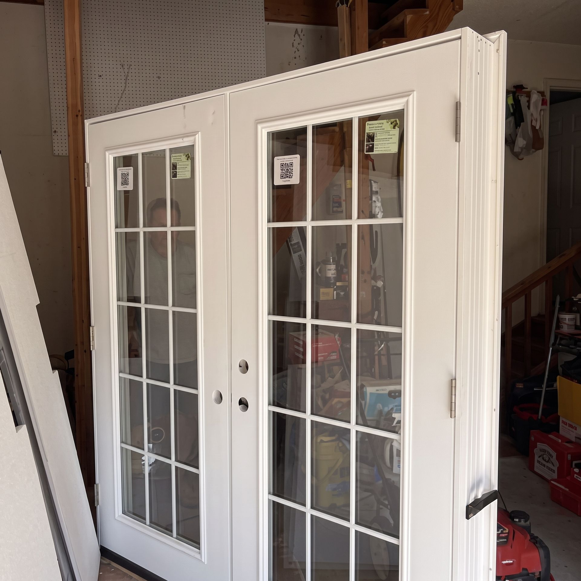 White French doors with glass panes in a garage or storage area