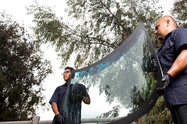 Two Man Carrying The Windshield — Fort Worth, TX — Auto Glass Xperts