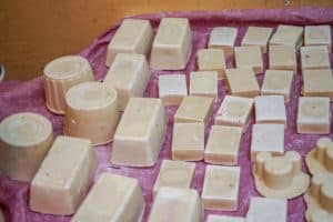 There are many different types of soap on the table.