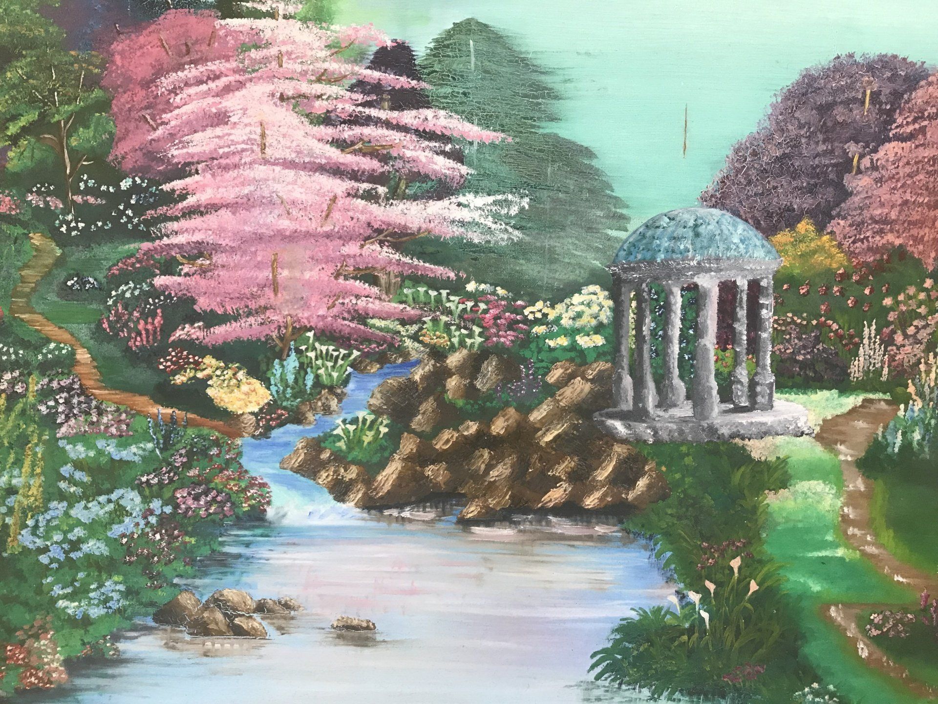 A painting of a river surrounded by trees and flowers