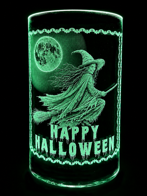 Glowing green Halloween candle with a witch, moon, and “Happy Halloween” text