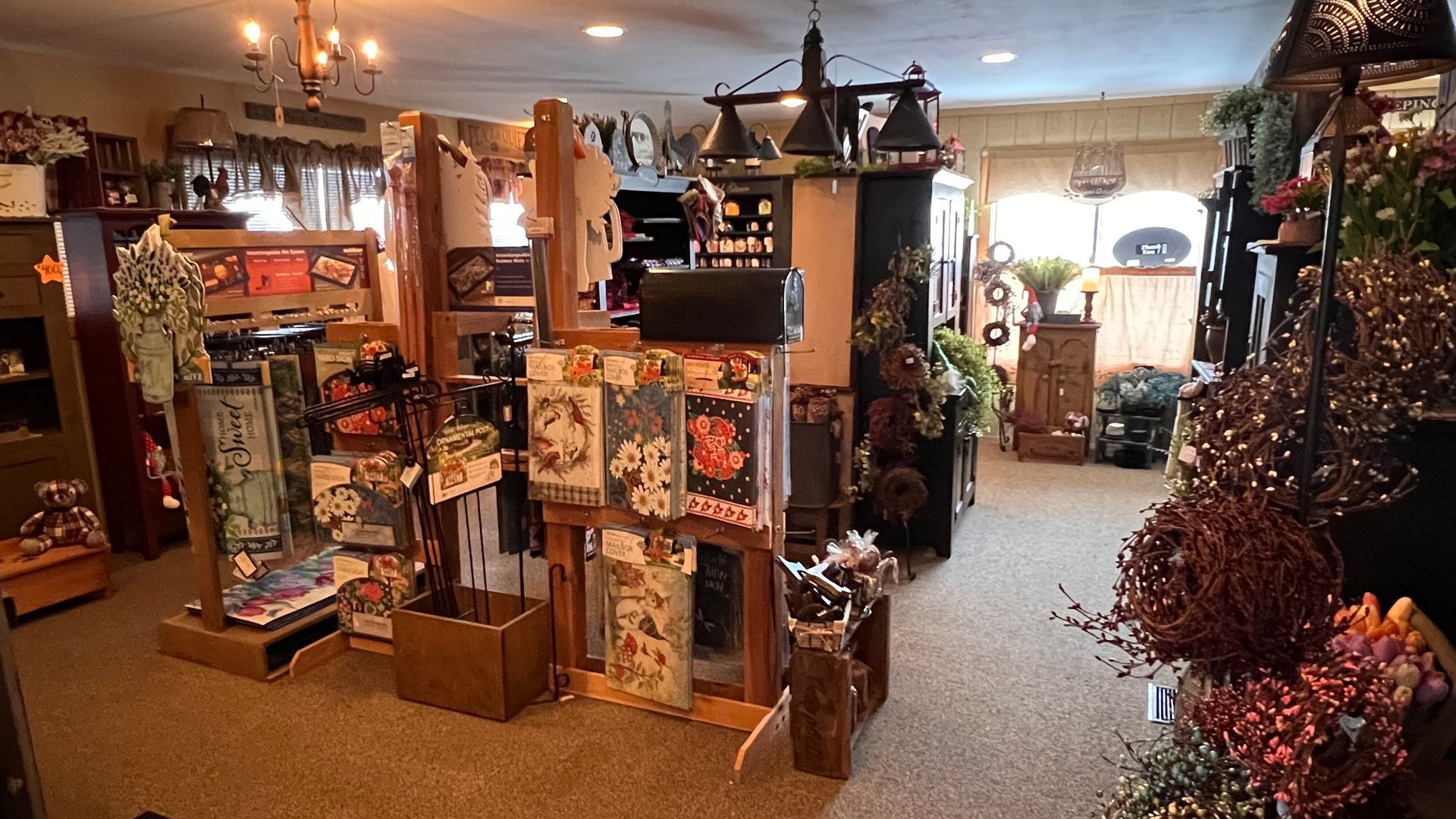 A store filled with lots of items including a christmas tree