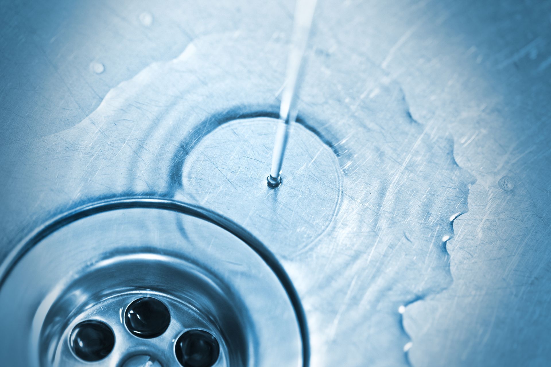 Draining Water in Sink — Duluth, MN — AquaTech Duluth Plumber