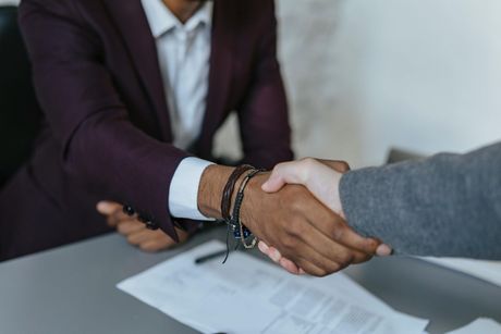 Our Partners Professional shaking hands for a successful partnership about B2B energy services.