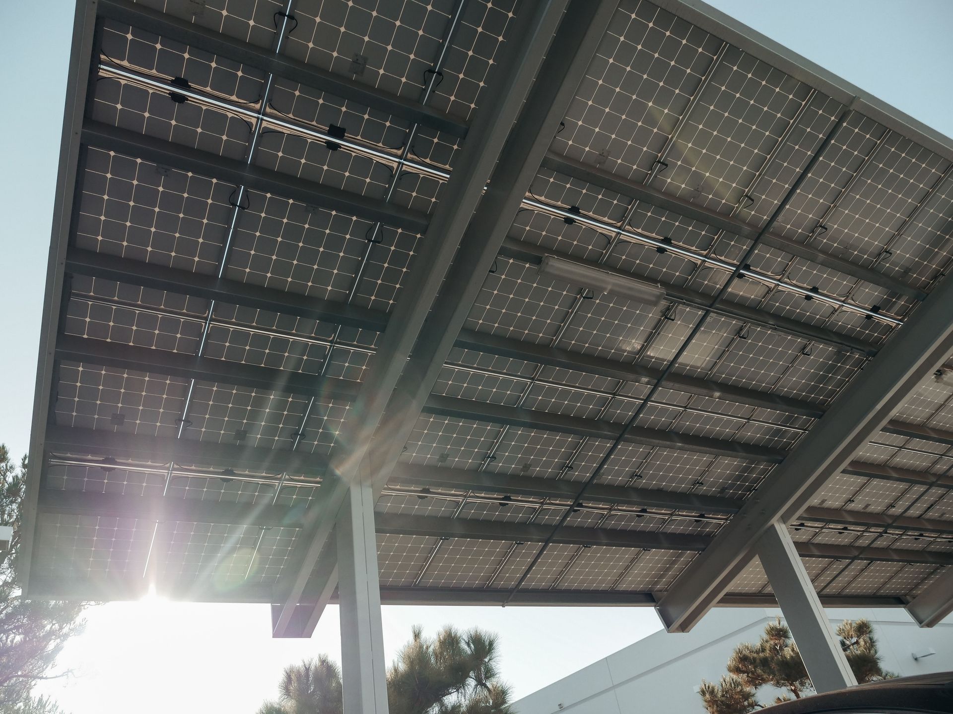 Solar Carports: Reducing Energy Costs & Improving ROI Solar Carports: Reducing Energy Costs & Improving ROI