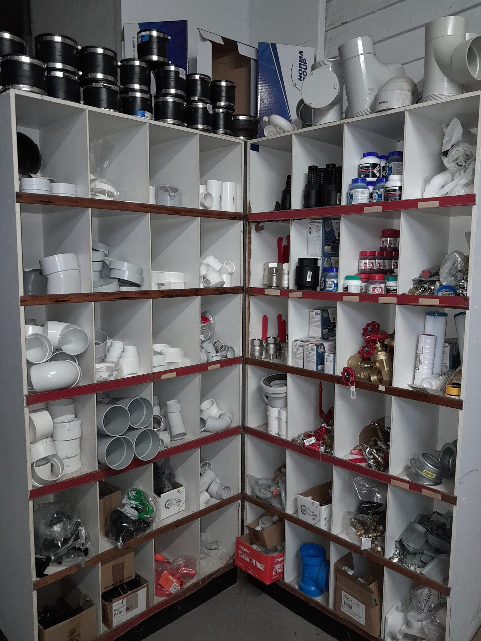 A Person is Fixing a Pipe That is Leaking Water — Farm and Home in Nabiac, NSW 